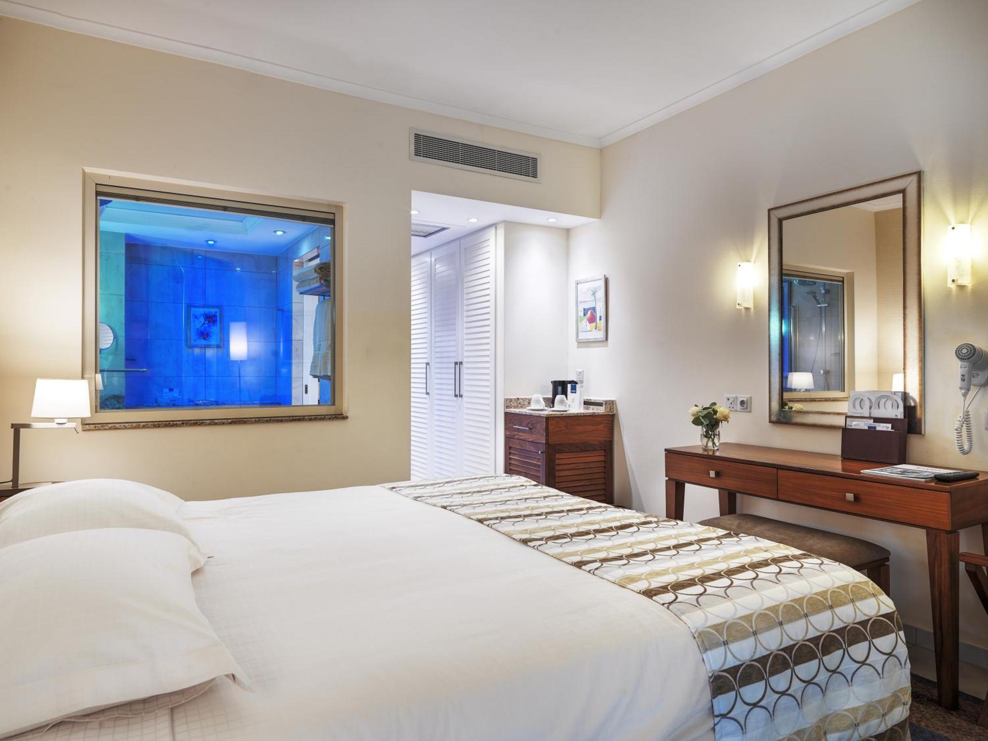 Deluxe Tweepersoonskamer met 1 of 2 Bedden - Frontaal Uitzicht op Zee