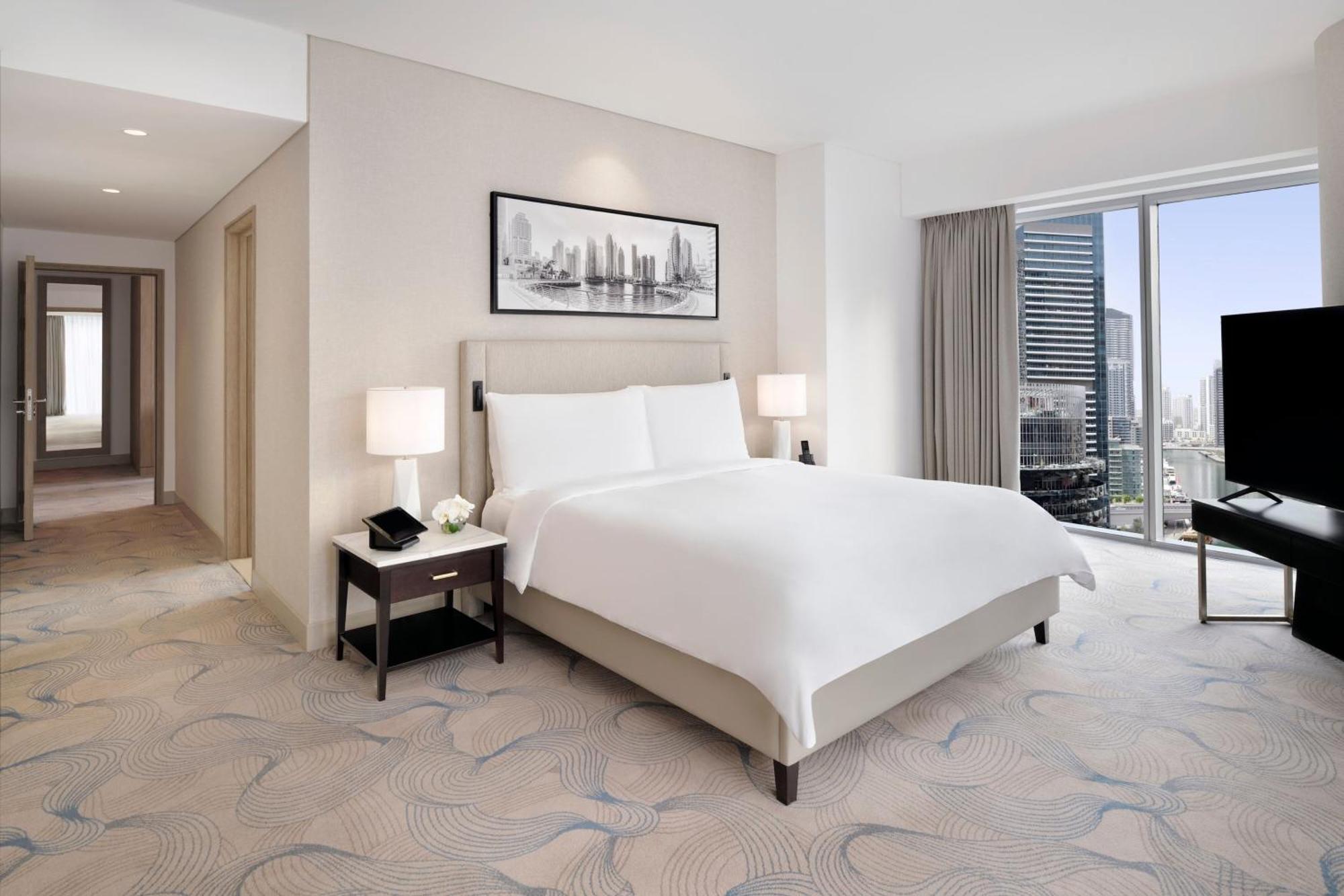 Premier Marina View Suite King bed Sofa bed Club lounge access Lunch & 4PM Late checkout Including direct access to Dubai Marina Mall & Marina Walk,1596867587:JPEG