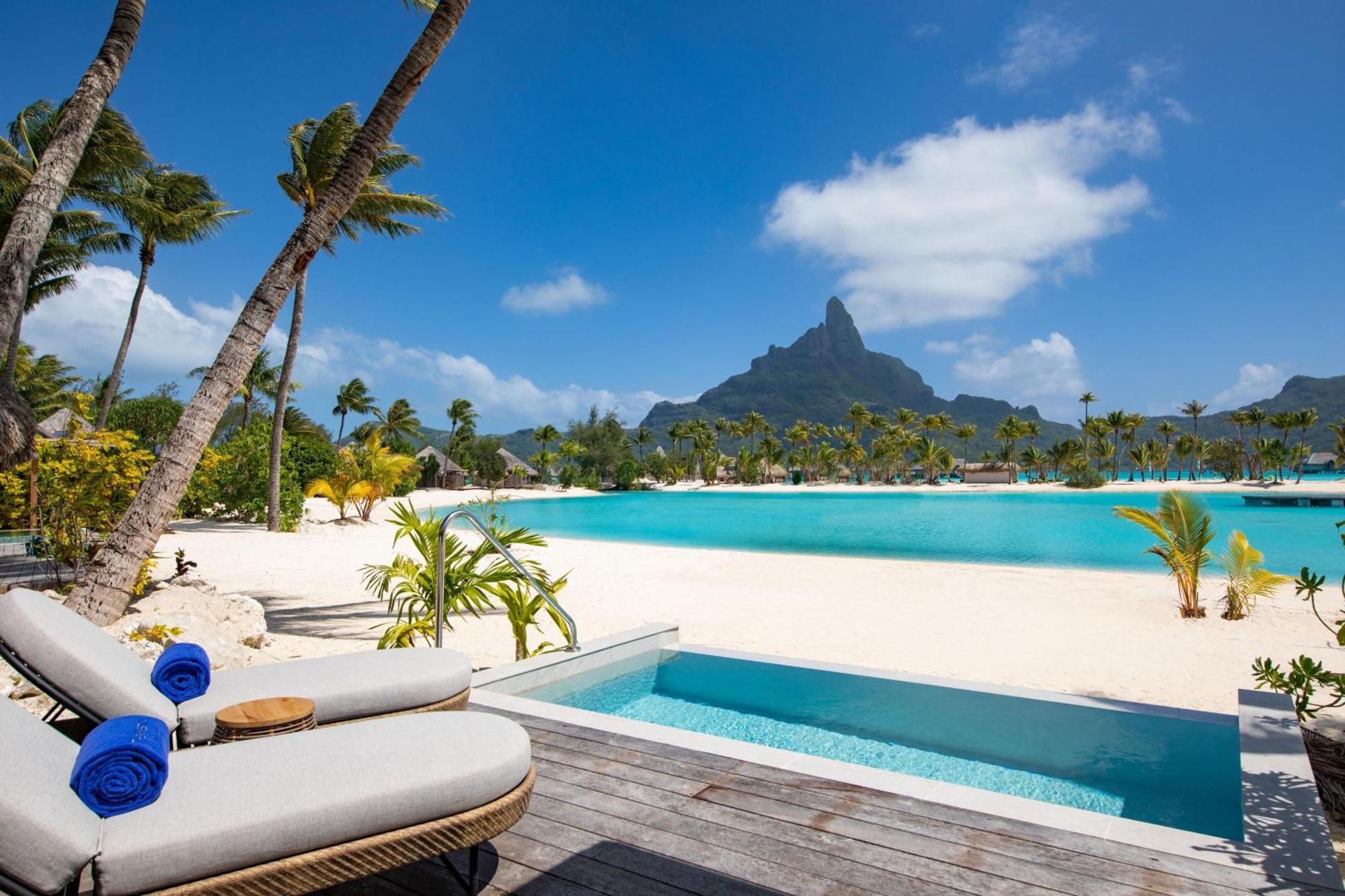 Strandbungalow mit Blick auf die Lagune und Tauchbecken