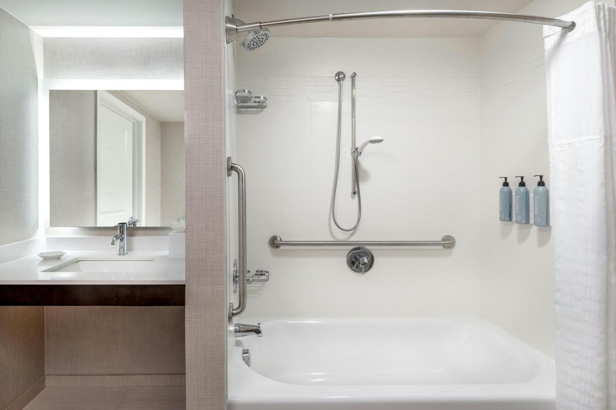 One-Bedroom King Suite Sofa Bed Adapted Tub Mobility Hearing Accessible,1742706123:JPEG