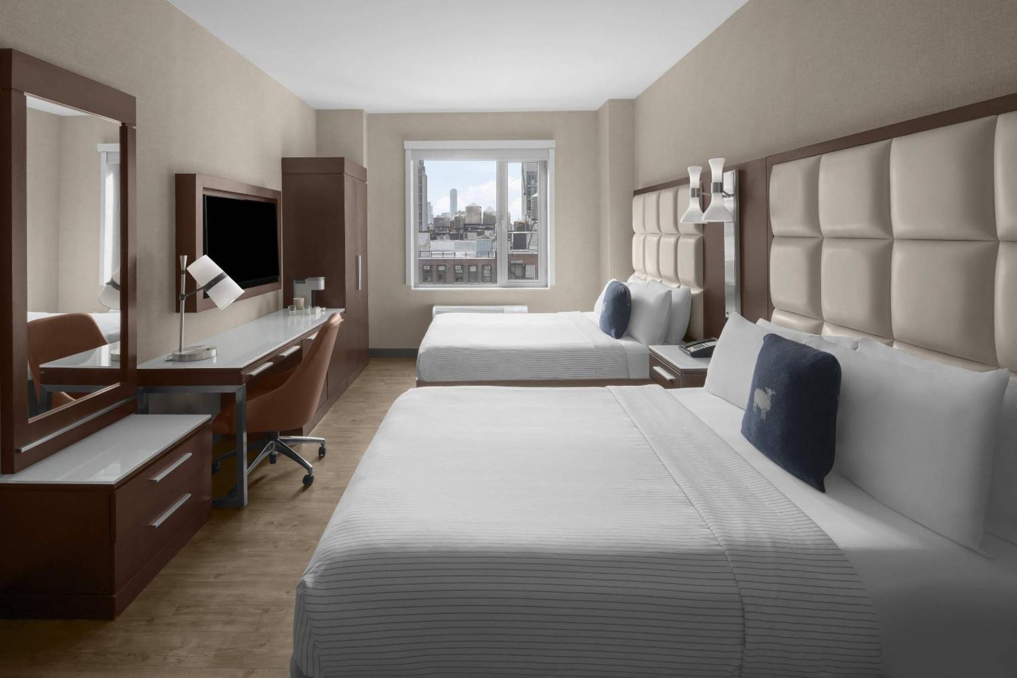 Deluxe Queen Suite Two Queen Beds City View Non-Smoking