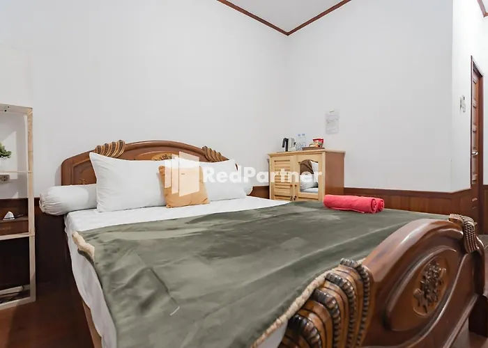 Langkar Guest House Syariah Mitra Reddoorz