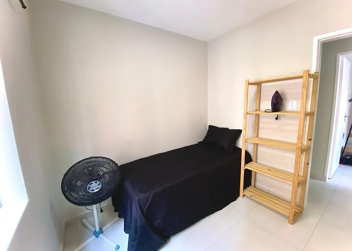 Apartamento no centro, ar-condicionado e garagem