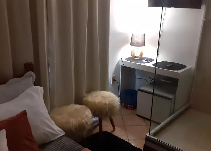 Banheiro de Vidro em Suíte compacta.Centro