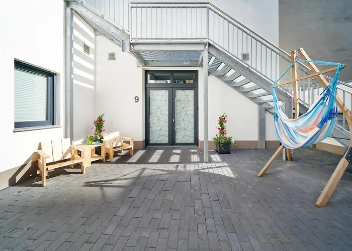 Design Apartment mit kostenfreiem Garagen Parkplatz im Zentrum