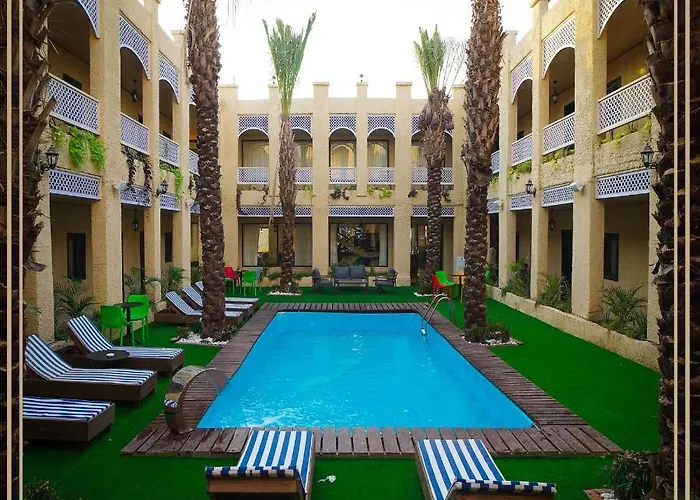 Qasr Alnkheel Resort And Hotel