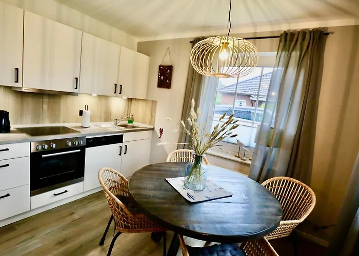 Nessmersiel, Renovierte Erdgeschosswohnung mit Garten, in Deichnähe, Wallbox,