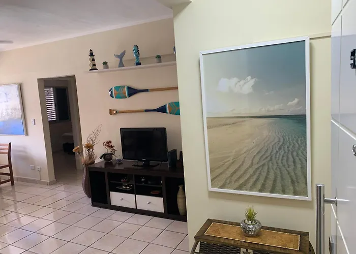 APARTAMENTO NA PRAIA GRANDE A 200 MÉTROS DA PRAIA, CONFORTÁVEL ESPAÇOSO WIFI 350 Mega TV Claro, ÓTIMA LOCALIZAÇÃO