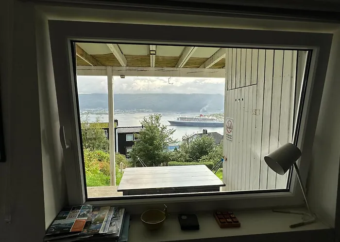 Great Place With A Stunning View Of The Mountains And The Fjord