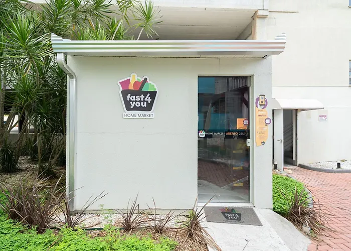 Apto em Barra Velha 340m da PRAIA com SACADA com CHURRASQUEIRA, AR CONDICIONADO WI-FI, PISCINA, PORTARIA 24h, ACADEMIA MINI MERCADO e vaga de GARAGEM