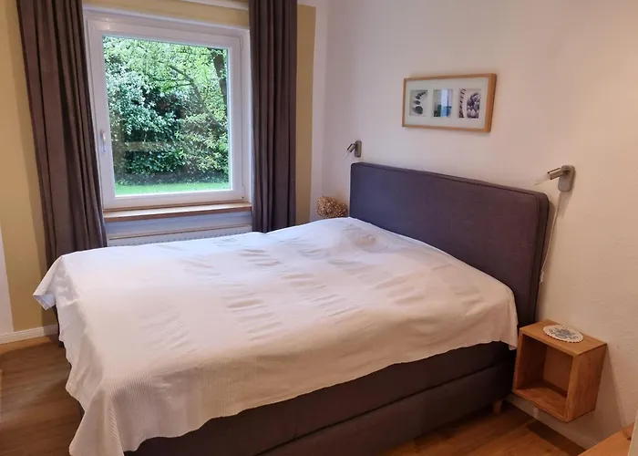 Stadtnahe Wohnung mit Garten und Parkplatz