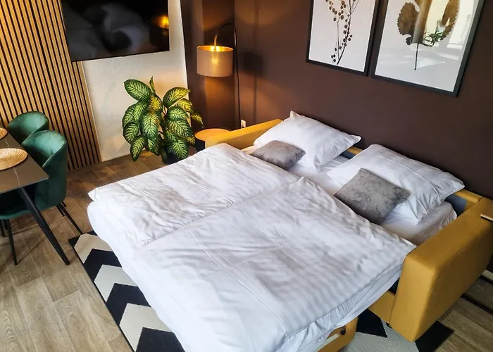maremar - Design Maisonette Altstadt - 4 Pers - 57qm - Luxus Boxspringbett - Küche - Arbeitsplatz - privater Parkplatz