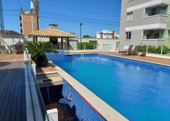 Easy Club 308 Apto 2 quartos Ar condicionado Wi-Fi Netflix Prime piscina Elevador Churrasqueira Sacada 200 m da praia Ideal para Famílias e Amigos Reserve agora