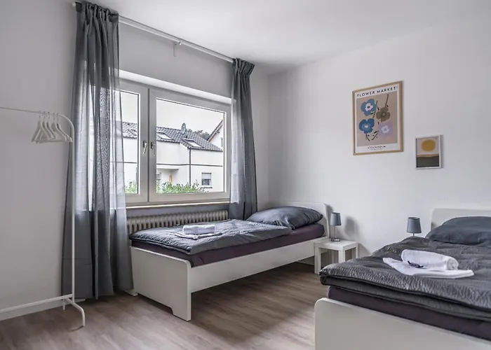 Voll ausgestattete Apartments mit Einzelbetten - Küche - WLAN - PKW-Parkplatz