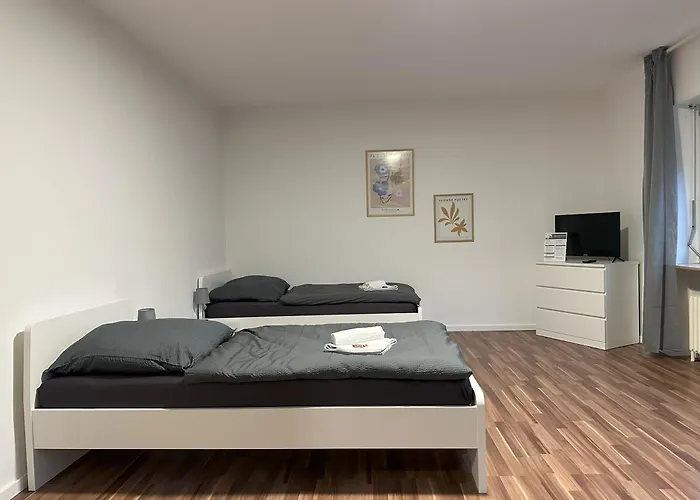 Voll ausgestattete Apartments mit Einzelbetten - Küche - WLAN - PKW-Parkplatz
