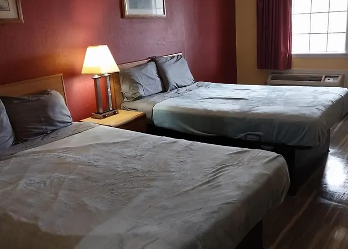 Gated 2 Queen Beds Hotel Room 112