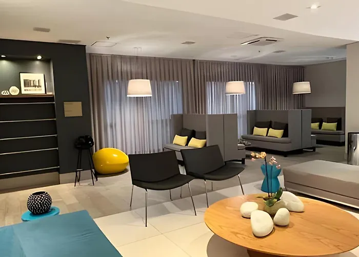 Suíte em flat no Gonzaga Stay Helbor