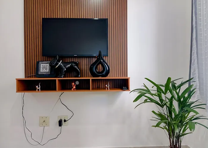 Apto mobiliado perto do centro com garagem