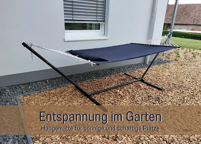 FeWo Blaue Lagune Northeim- neu, modern, geräumig - 100 qm - 3 Schlafzimmer- bis 6 Gäste, Kleinkinder reisen gratis - mit Garten, Grill&Terrasse - Fußbodenheizung - Smart-TV - Küche mit Backofen Spühlmaschine, Toaster - Fahrradkeller - nahe Götting