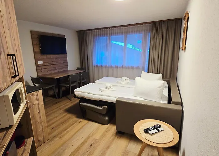 Chalet Graben - Aare Jungfrau AG