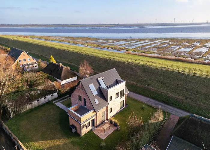 Deichkoje12 Deck 1 EG direkt am Eiderdeich nur 7 km bis zur Nordsee und 20 Min bis Sankt Peter Ording