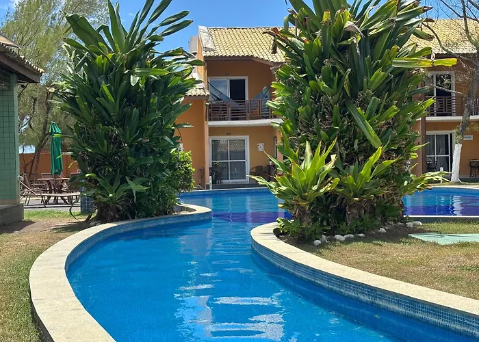 Village frente ao mar pé na areia