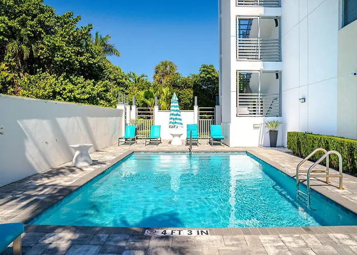 Across From Beach | Balcony • Pool • Parking • 2Br