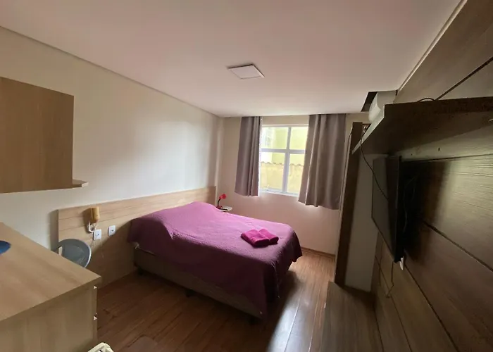 Flats da Júnia 110 - funcional com ar, garagem, tv, microondas, frigobar e 14 km aeroporto