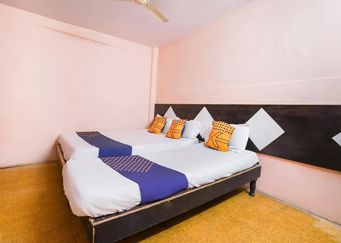 Spot On 65100 Delhi Lodge