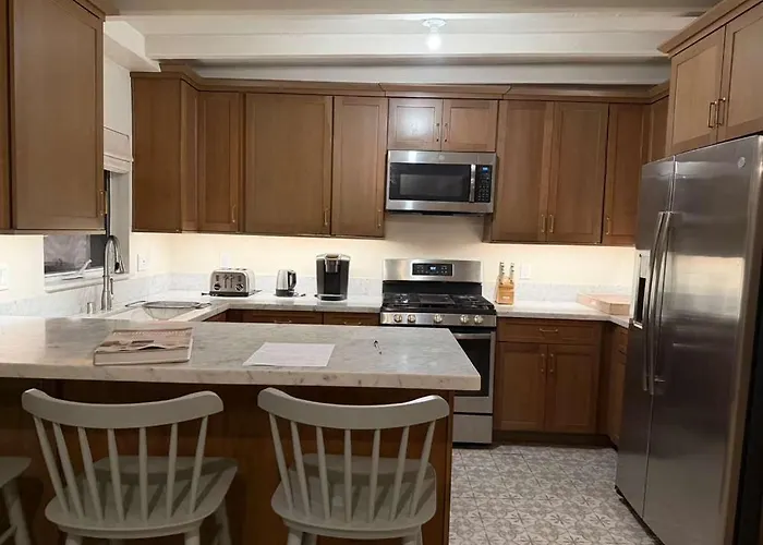 Modern 2BR Beach Walk Retreat with King&Coastal Vibe
