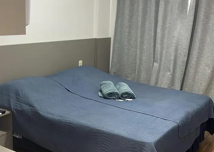 Flats da Júnia, CAMAS SEPARADAS OU JUNTAS, fácil check-in, wifi , tv, ar, garagem