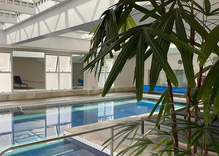 Flat no Stadium Alphaville - Recepção 24h, piscina aquecida e estacionamento gratuito