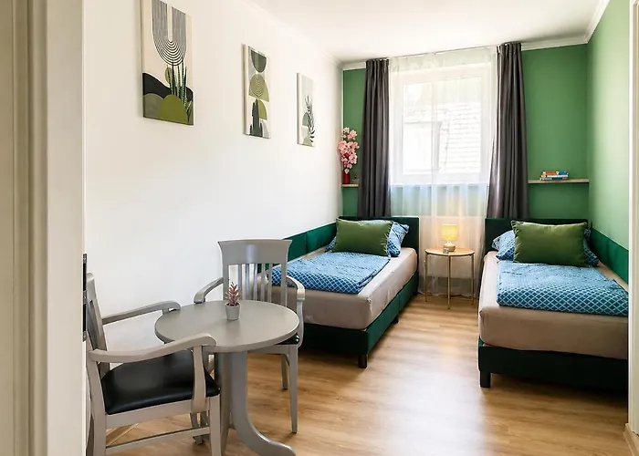 Ferienwohnung Am Kirchplatz Klimatisierte Dachgeschosswohnung