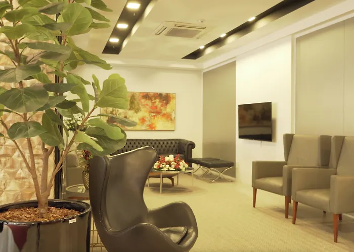 Mogano Premium Hotel - ELETROPOSTO